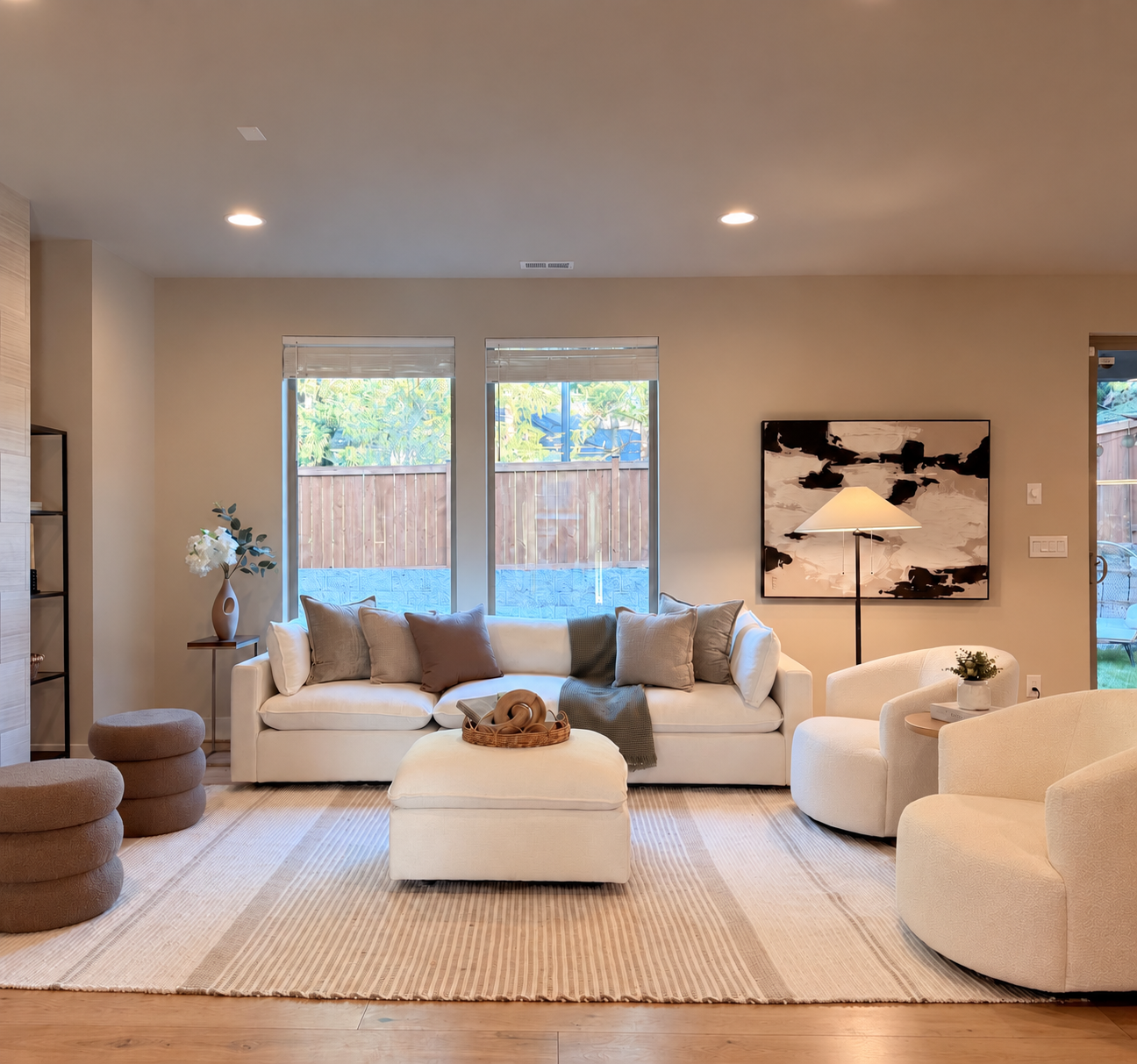 Neutral living room with white sofa and layered textiles