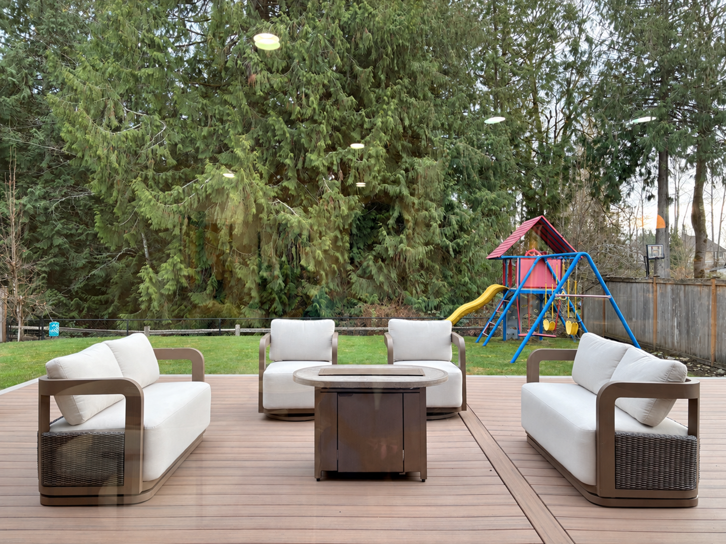 Outdoor lounge seating arranged around a low table